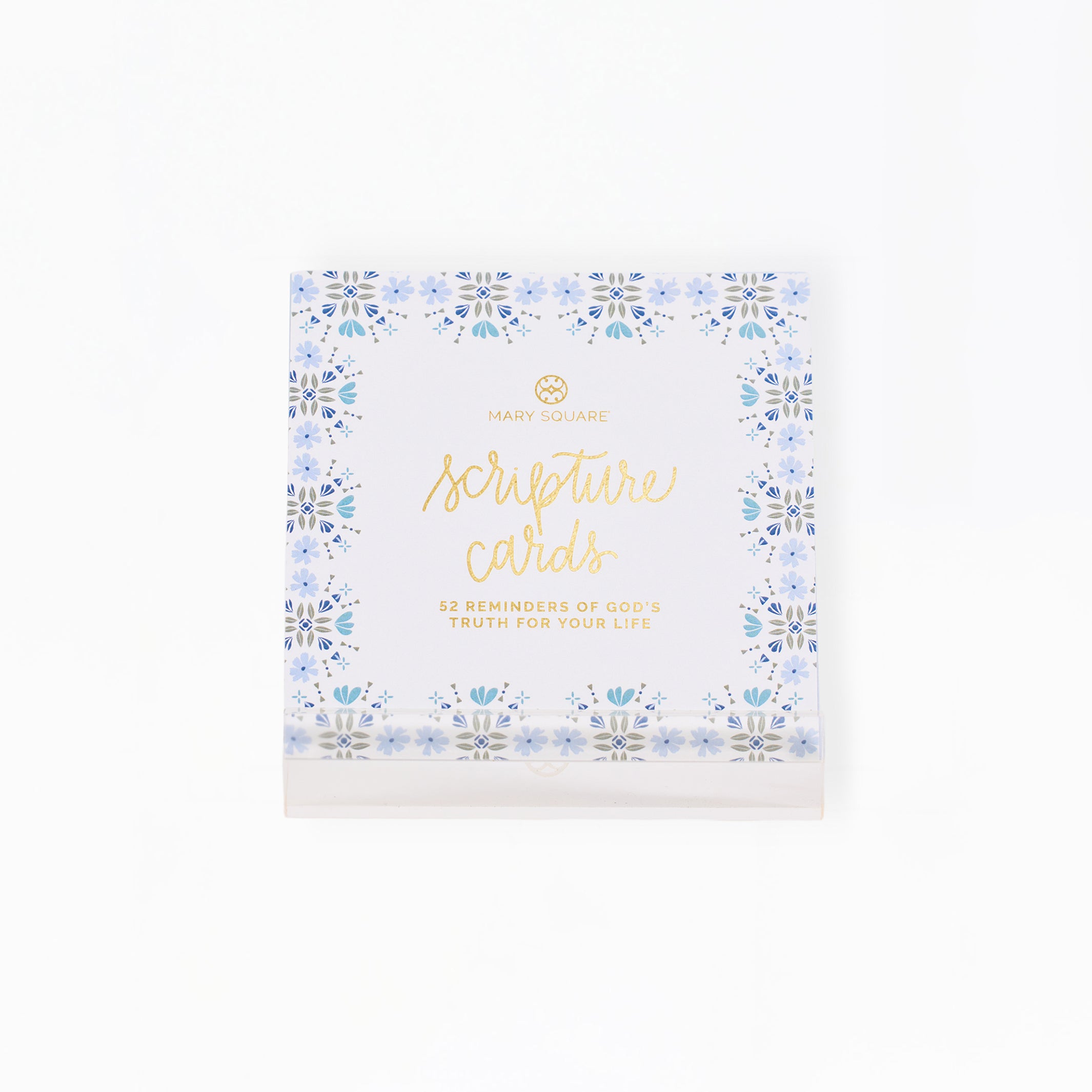 A boxed set of Happy Hour Cards by Happy Families, featuring a white package decorated with a light blue floral border and gold foil lettering, set against a plain white background.