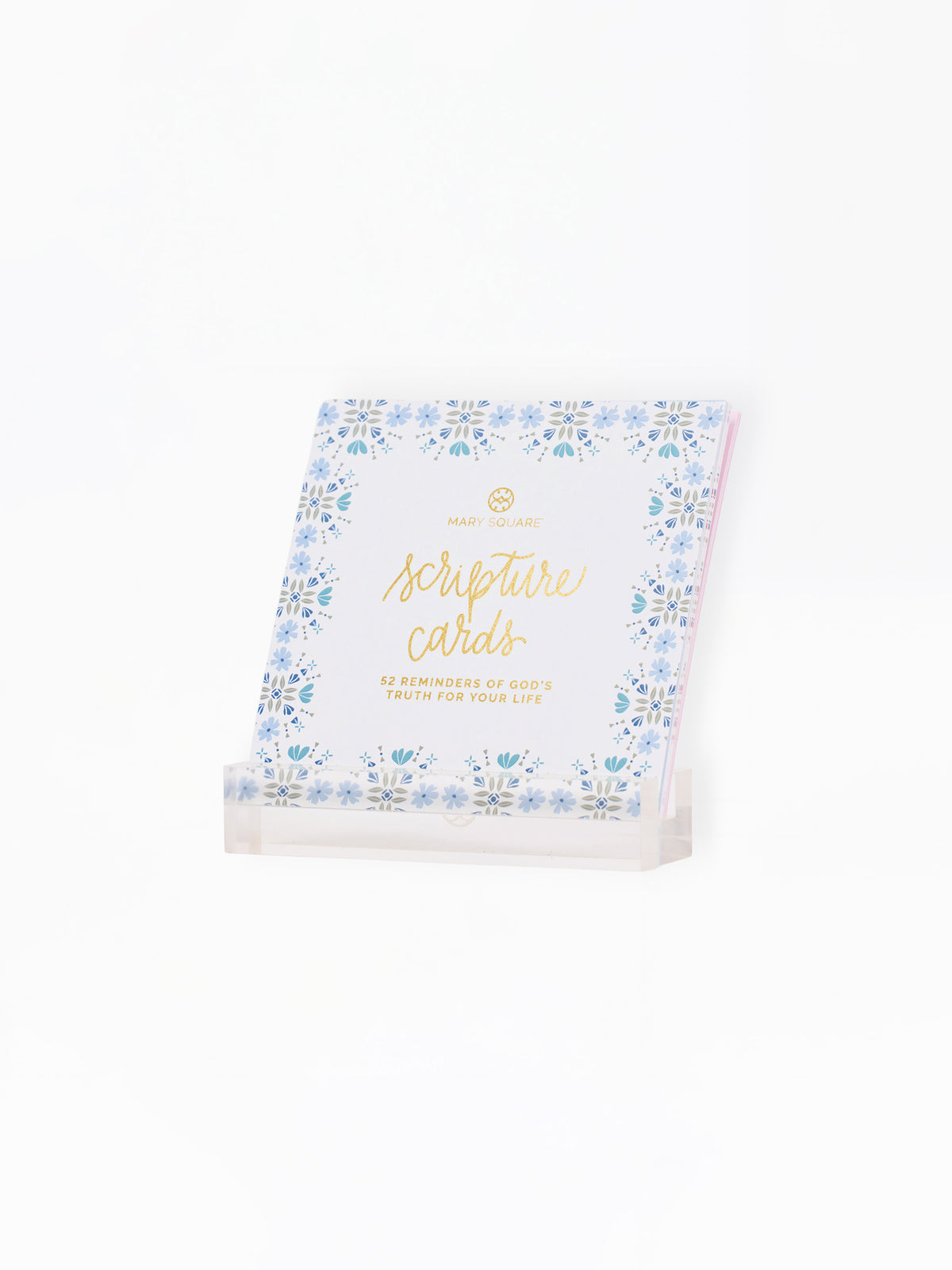 A package of 'Scripture Cards' by Good Words With God, featuring a white cover decorated with a blue floral border and gold foil lettering, displayed on a clear acrylic stand against a white background.