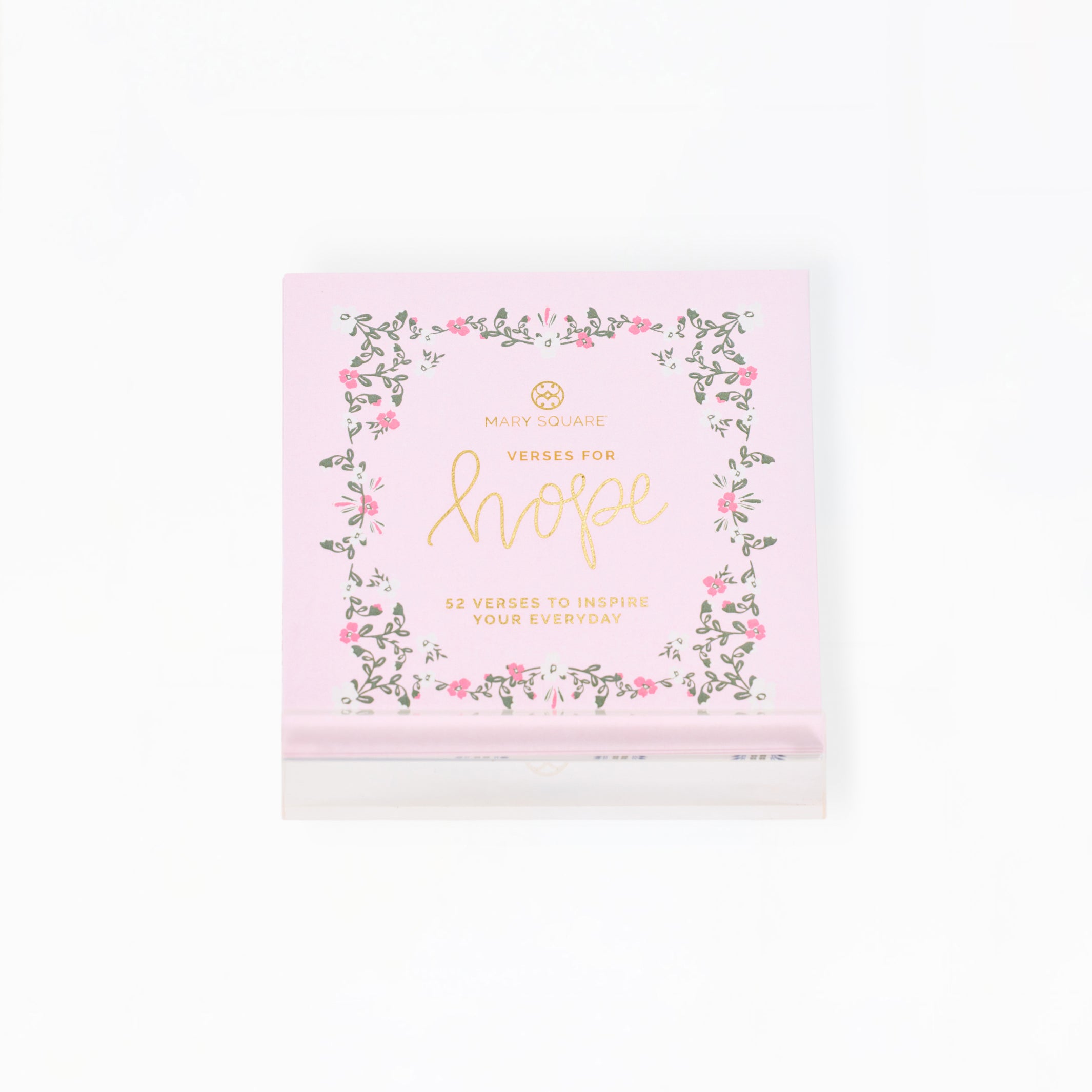 A pink square product box with a floral border and gold foil text reading 'Verses for hope' on a clean white background.