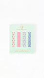 A package of four Mary Square magnetic bookmarks featuring assorted geometric patterns in pink, blue, and white, presented on a mint green backing card.