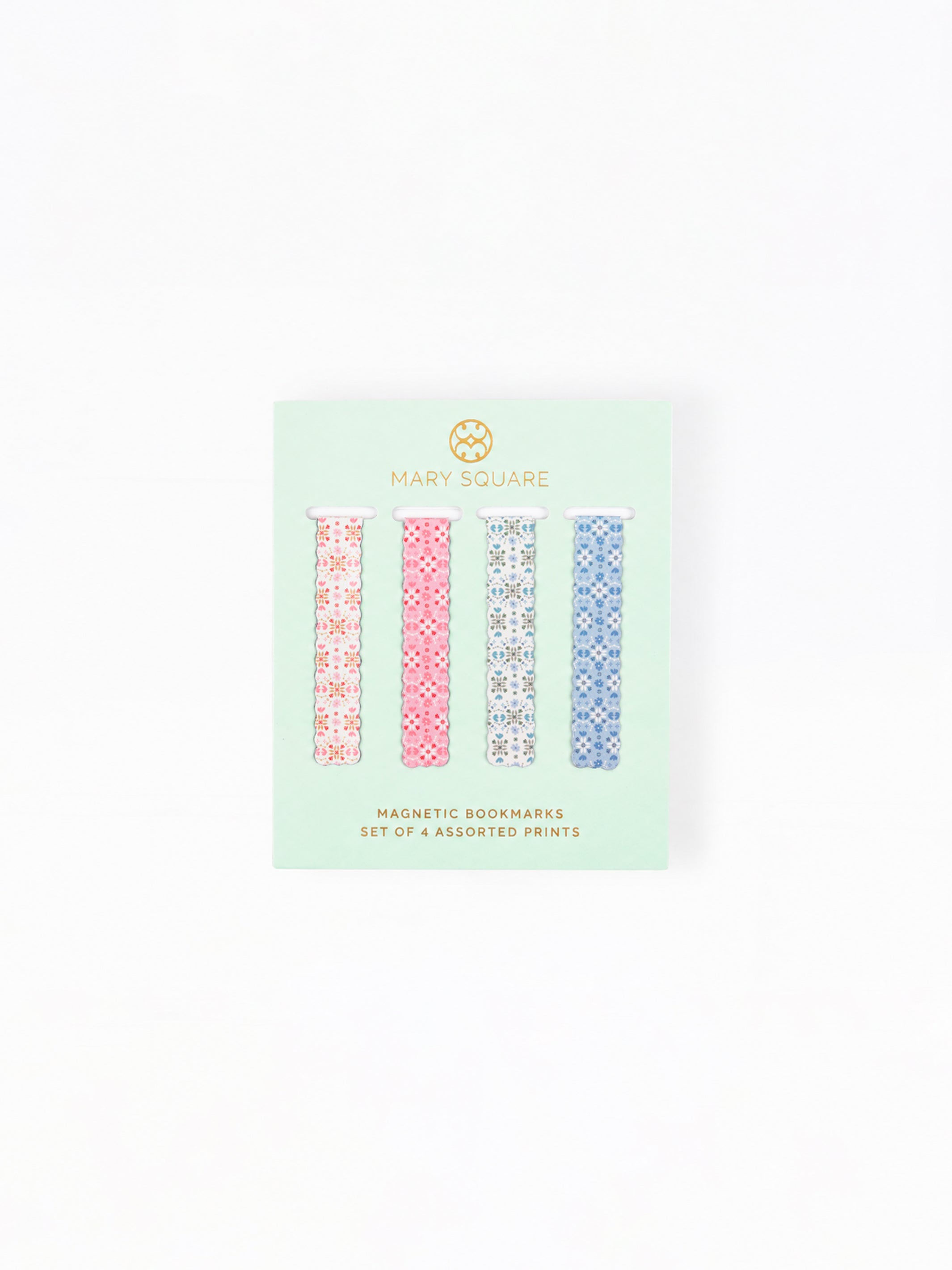 A package of four Mary Square magnetic bookmarks featuring assorted geometric patterns in pink, blue, and white, presented on a mint green backing card.