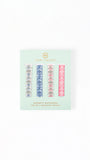 Mary Square magnetic bookmarks set in a mint green carded packaging, featuring four assorted floral patterned bookmarks in blue, pink, and white.