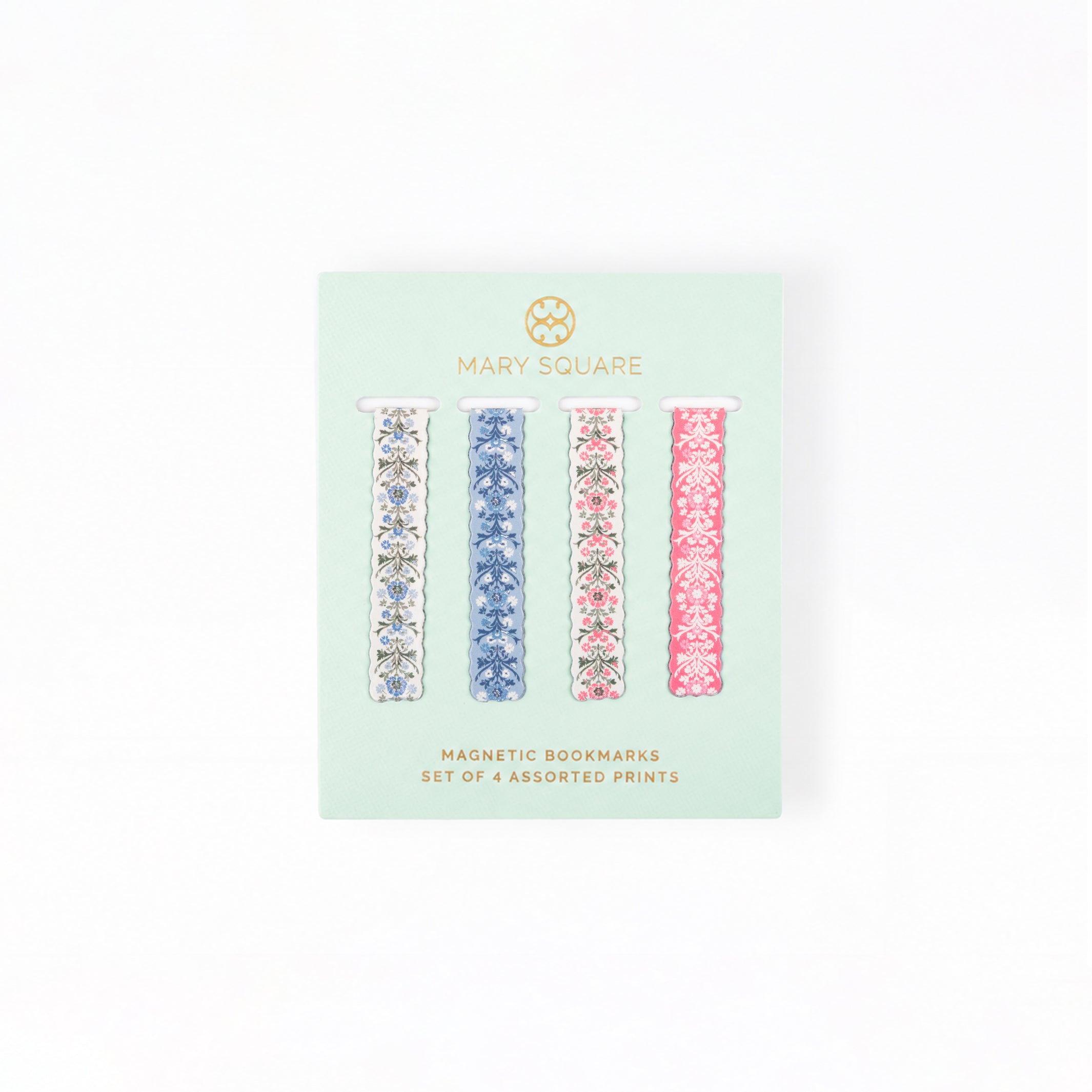 Mary Square magnetic bookmarks set in a mint green carded packaging, featuring four assorted floral patterned bookmarks in blue, pink, and white.