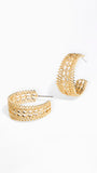 A pair of gold-toned, openwork hoop earrings with a textured, woven-like pattern, displayed on a clean white background.