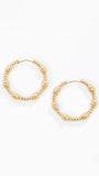 A pair of gold-toned textured hoop earrings with a knotted, rope-like surface detail, displayed on a clean white background.