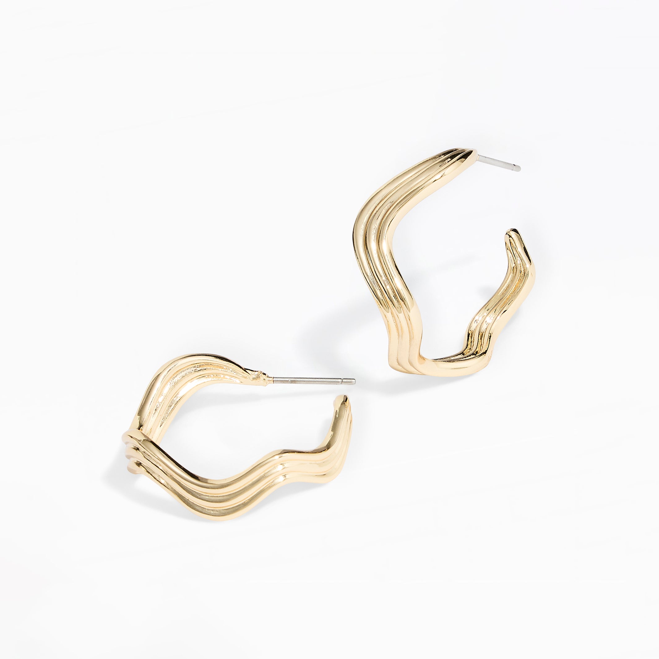 A pair of gold-toned wavy hoop earrings with a multi-strand layered design, displayed on a clean white background.