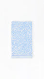 Light blue paper napkins with floral pattern on a white background