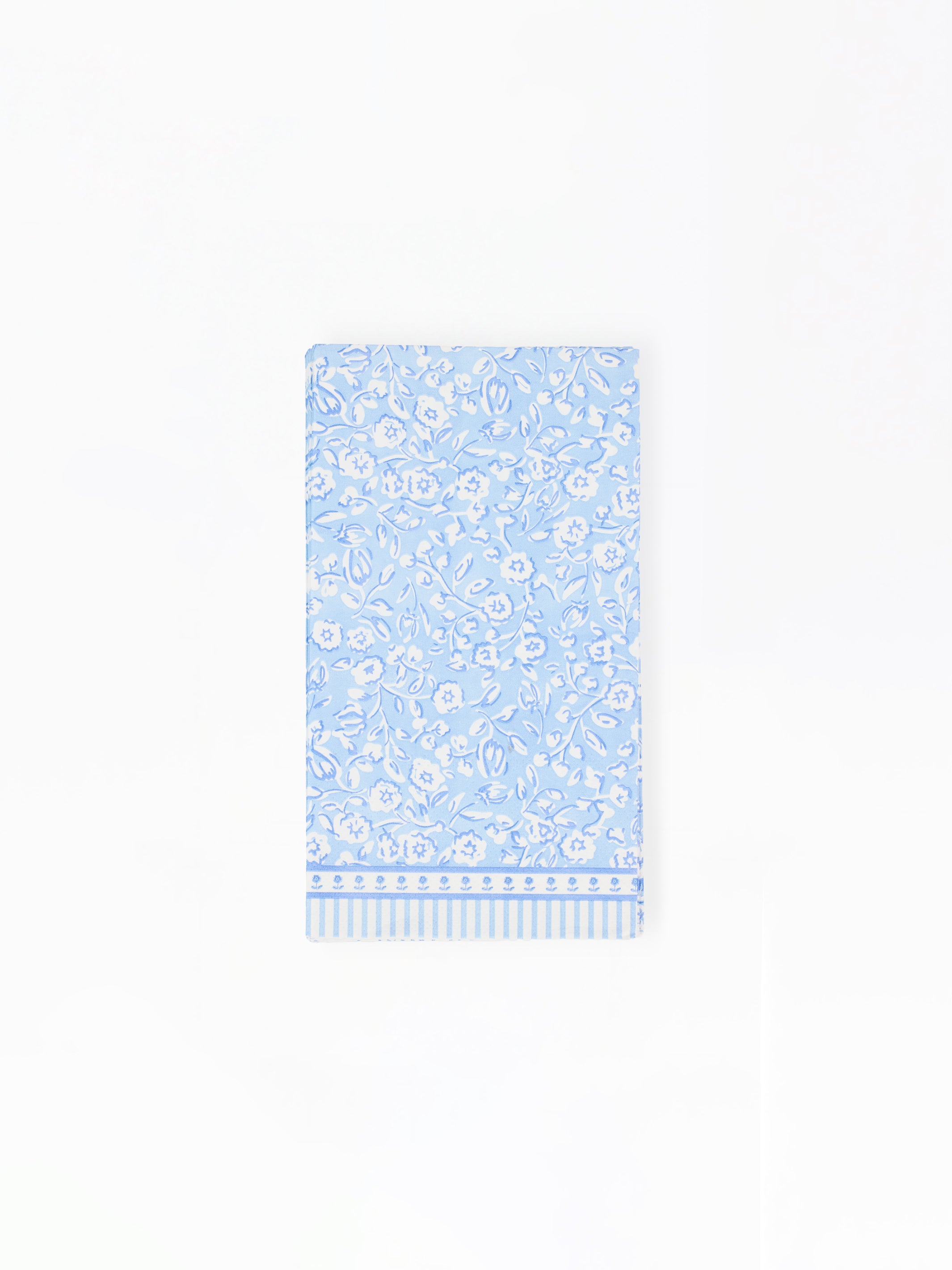Light blue paper napkins with floral pattern on a white background