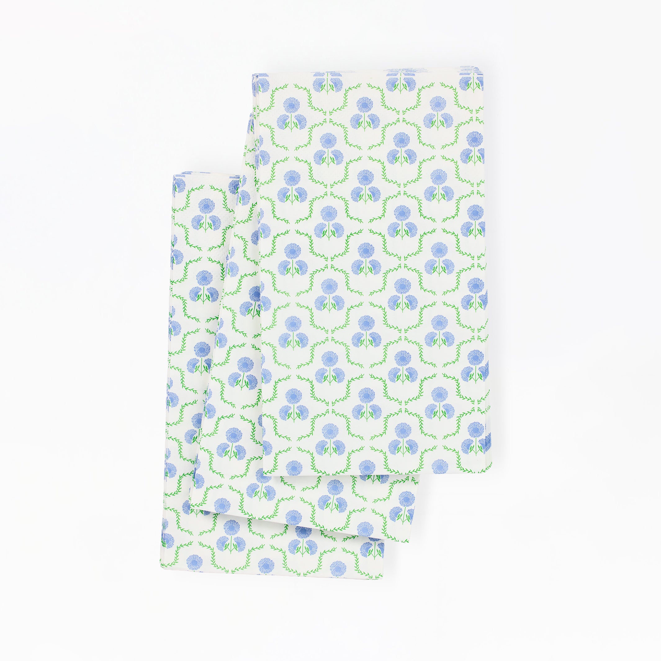 paper napkins with a blue and green floral pattern on a white background