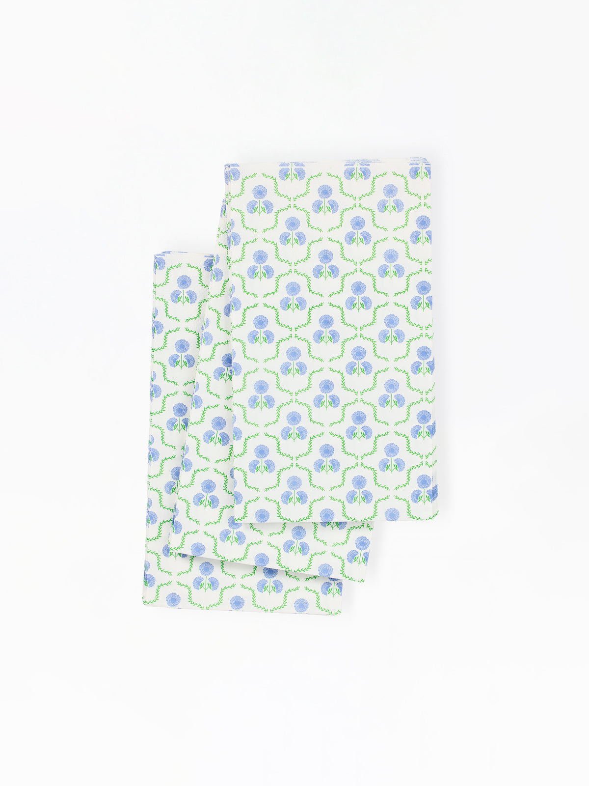 paper napkins with a blue and green floral pattern on a white background