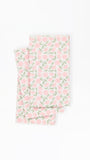 paper guest napkins with a pink floral pattern on a white background