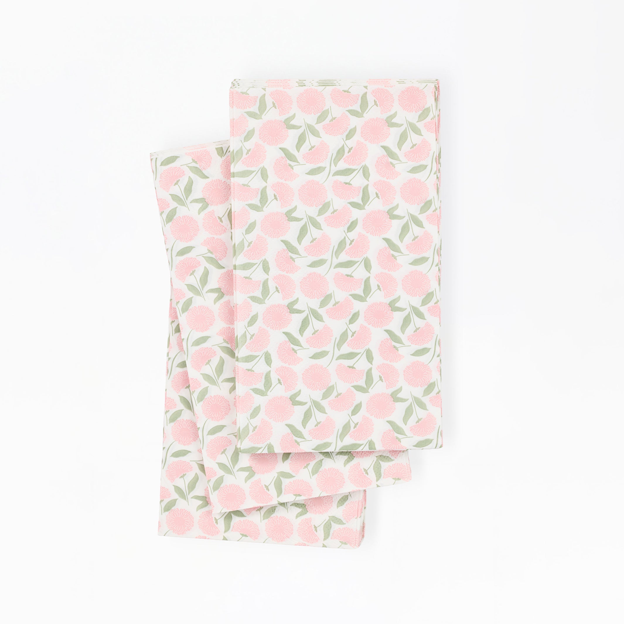 paper guest napkins with a pink floral pattern on a white background