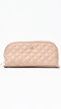 Quilted beige wallet on a white background