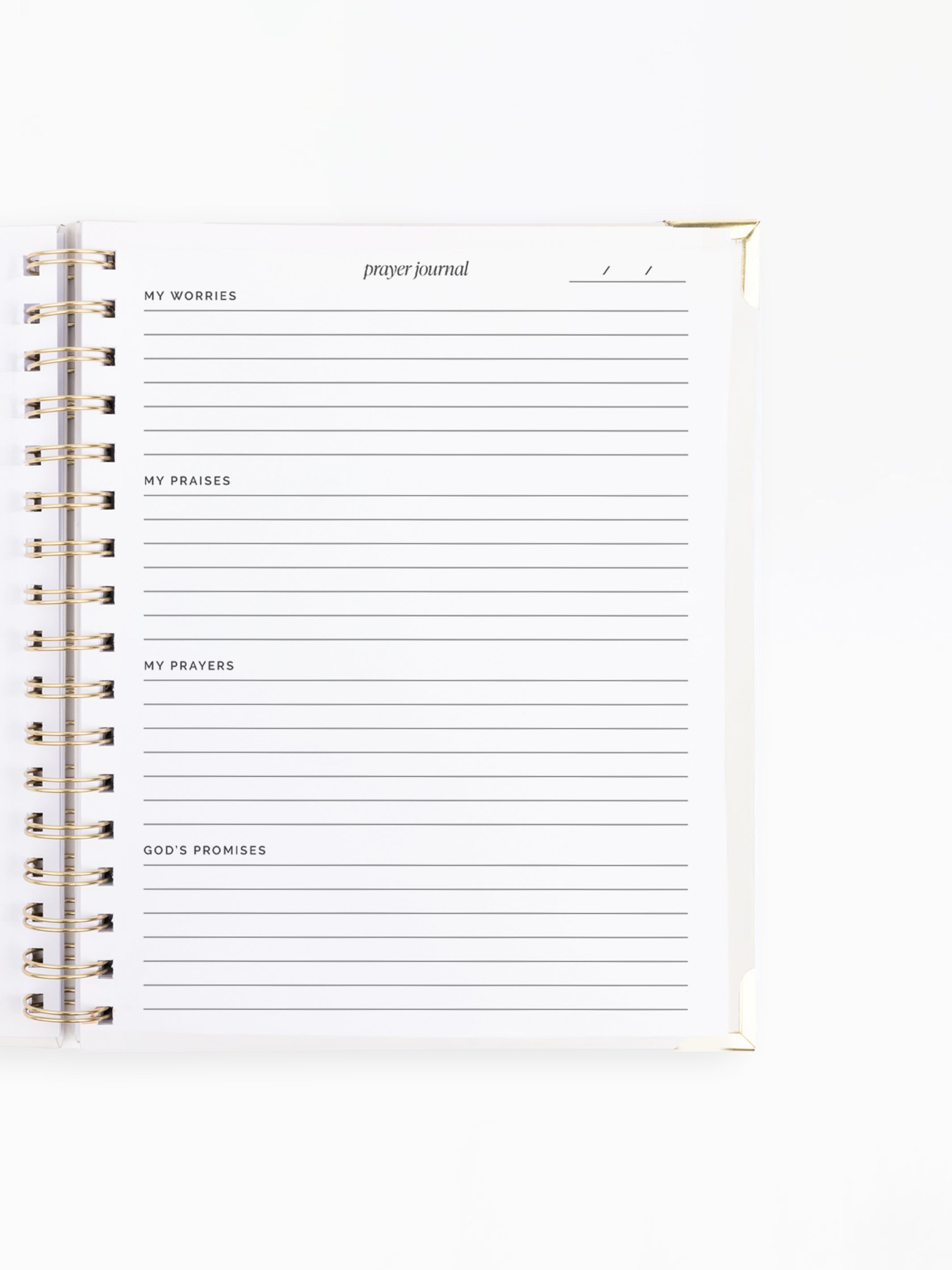 An open spiral-bound prayer journal showing lined pages with sections for 'my worries', 'my praises', 'my prayers', and 'god's promises'.