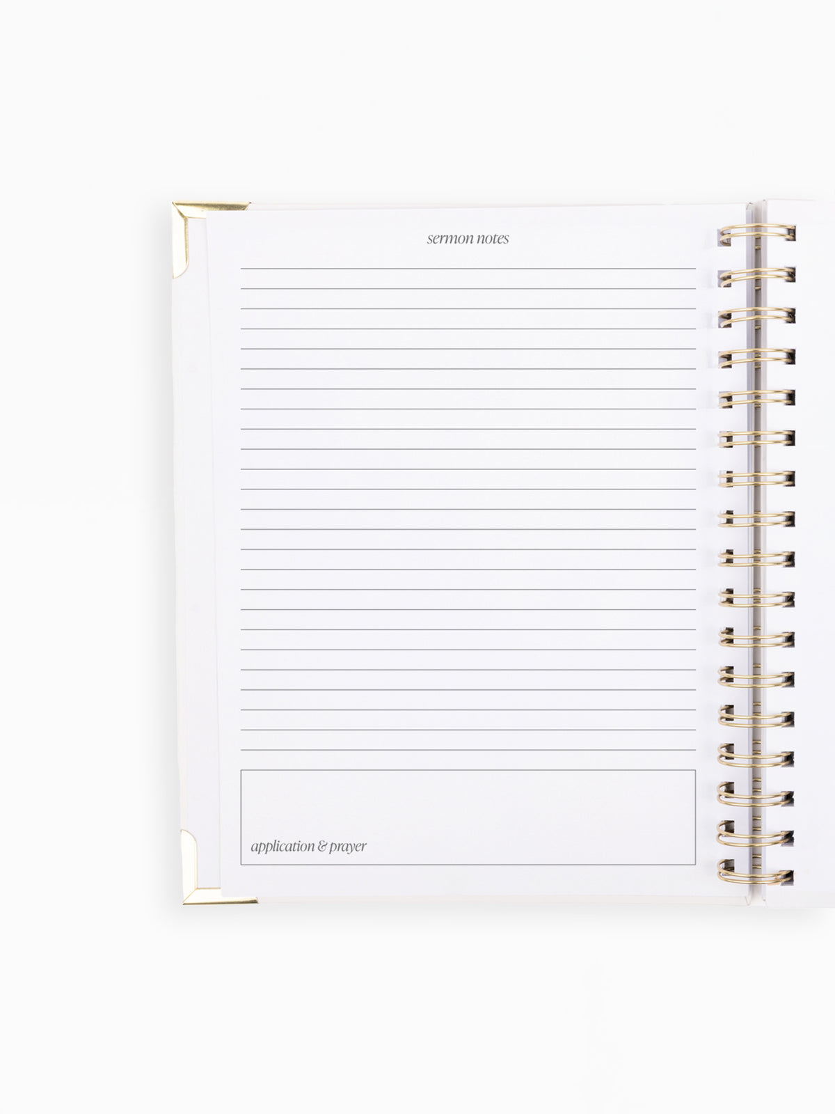 A white lined notepad page from an open spiral-bound planner, shown against a clean white background. The page has horizontal lines, a blank top section, and a bottom box labeled 'application & prayer'.