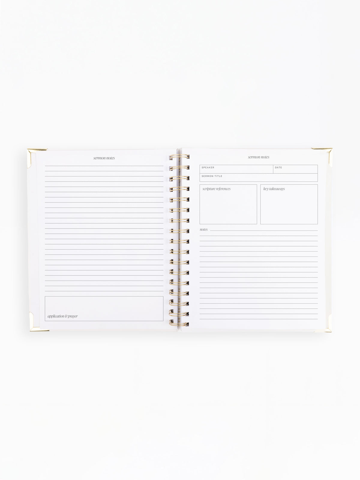 An open spiral-bound planner or notebook with lined pages and small blank boxes on the right page, photographed on a clean white background.