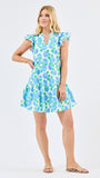Woman wearing a floral dress on a white background